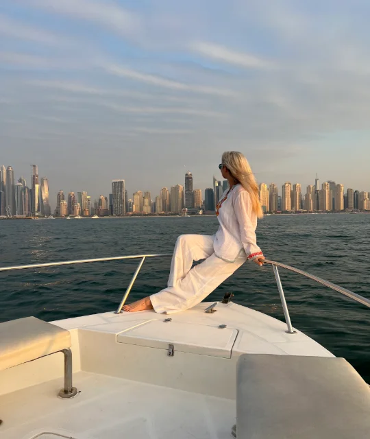 person sitting on a yacht in dubai