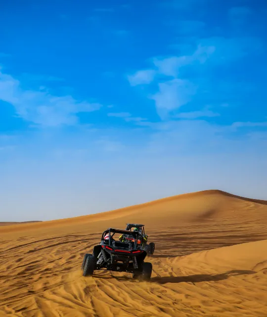 Couple on an extended 2-hour Polaris dune buggy expedition in Dubai
