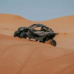 two seater polaris dune buggy driving in dubai red desert for 30 minutes